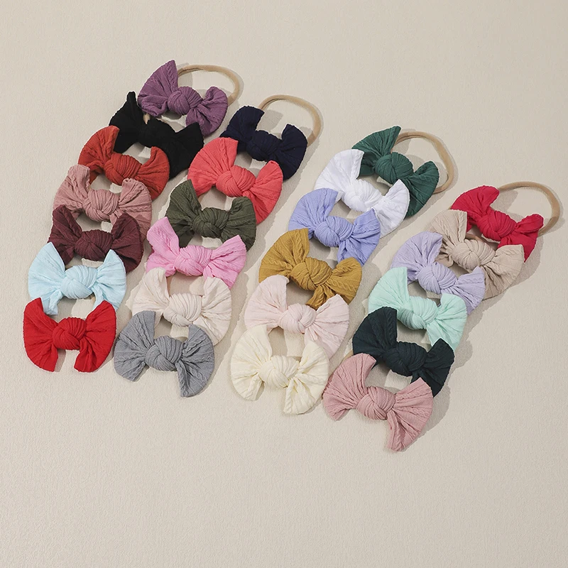 New Solid Bow Nylon Headband for Baby Girl Soft Hair Band for Newborn Baby Children Turban Kids Headwear Infant Hair Accessories
New Solid Bow Nylon Headband for Baby Girl Soft Hair Band for Newborn Baby Children Turban Kids Headwear Infant Hair Accessories