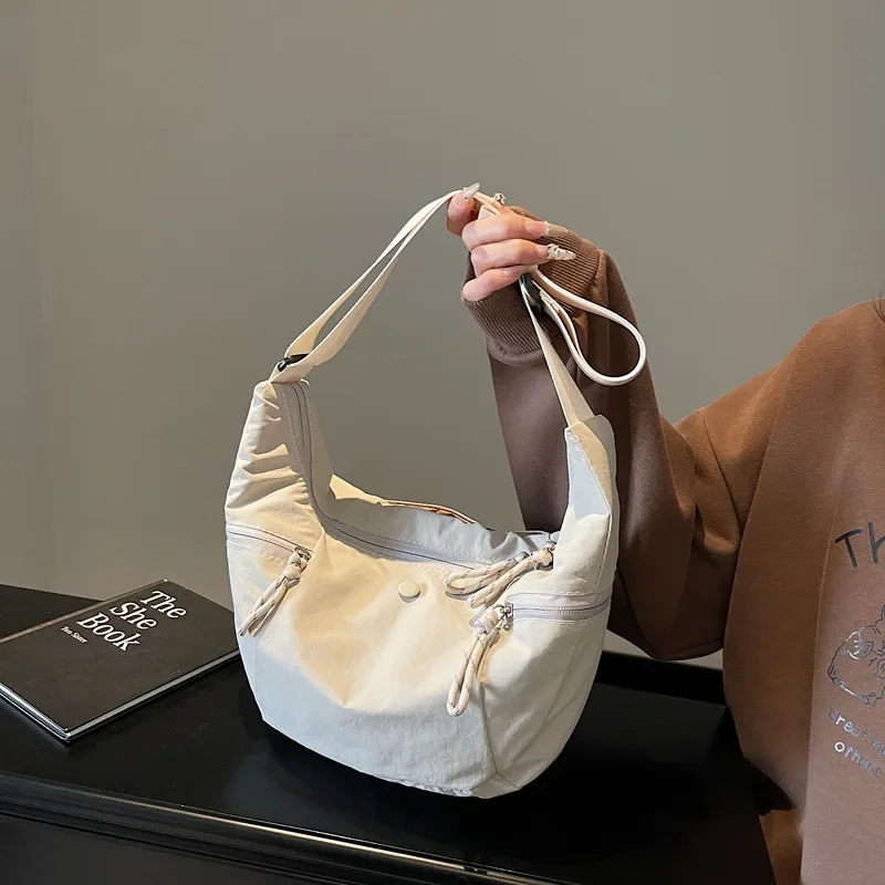 2025 New Large-capacity Casual Dumpling Bag - A Simple, Lightweight Shoulder Bag Ideal for Students and Fashionable Commuters
2025 New Large-capacity Casual Dumpling Bag - A Simple, Lightweight Shoulder Bag Ideal for Students and Fashionable Commuters