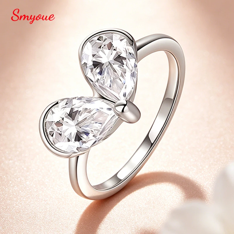 Smyoue 1.5CT 6*9mm Pear Cut Moissanite Ring for Women 2 Gems Luxury Jewelry Lab Diamond Wedding Band 100% S925 Sterling Silver
Smyoue 1.5CT 6*9mm Pear Cut Moissanite Ring for Women 2 Gems Luxury Jewelry Lab Diamond Wedding Band 100% S925 Sterling Silver