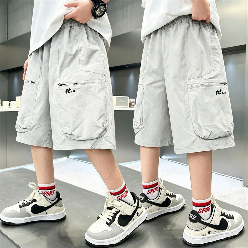 New Boys Summer Fashion Cargo Shorts with Zipper Pockets Kids Casual Loose Thin Knee-Length Trousers for 7-16 Years Old Teenager
New Boys Summer Fashion Cargo Shorts with Zipper Pockets Kids Casual Loose Thin Knee-Length Trousers for 7-16 Years Old Teenager