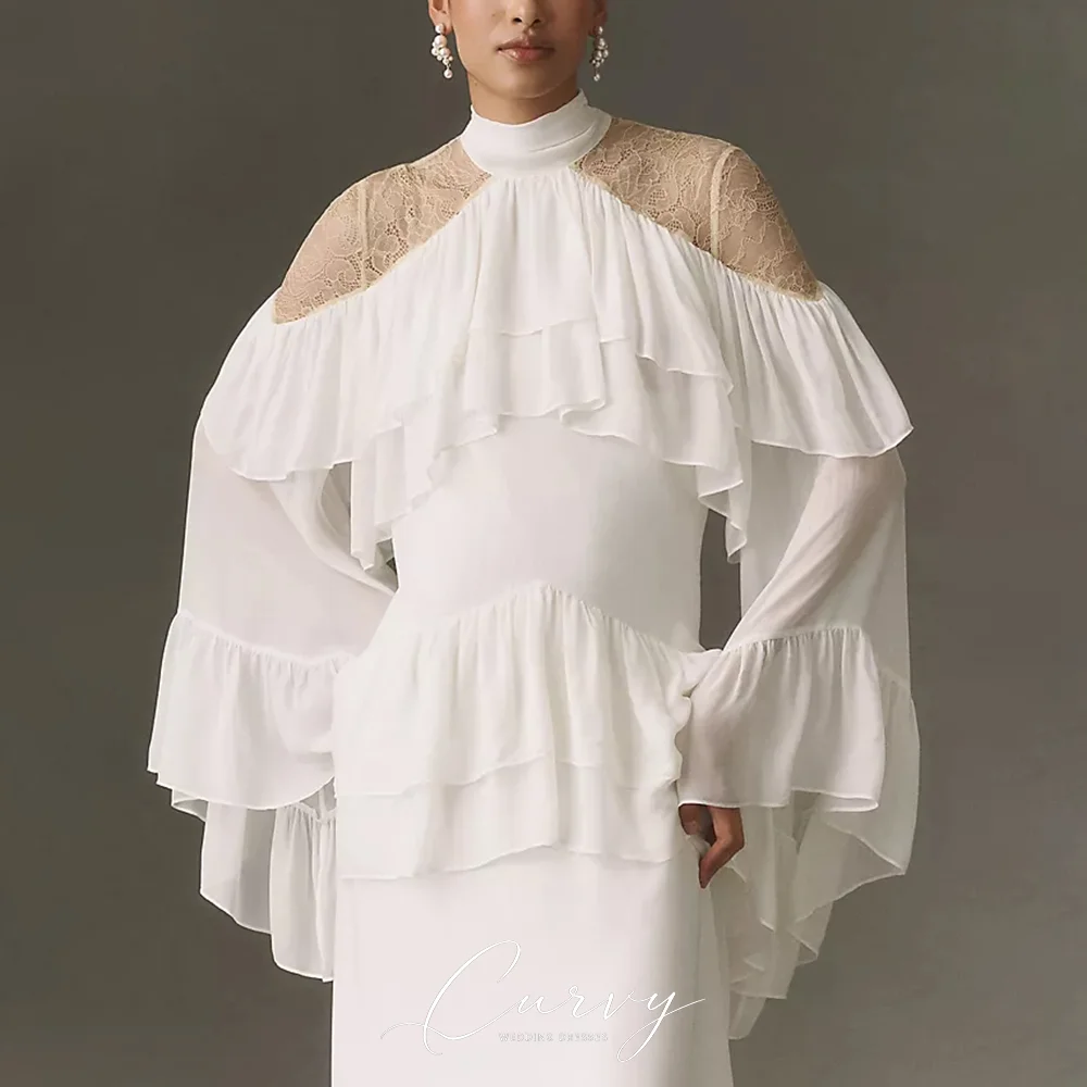 Curvy Whimsical Soft Ivory Chiffon Bridal Gowns High Neck Sheer Lace Shoulder Tiered Ruffle Bell Sleeve Customized for Women
Curvy Whimsical Soft Ivory Chiffon Bridal Gowns High Neck Sheer Lace Shoulder Tiered Ruffle Bell Sleeve Customized for Women