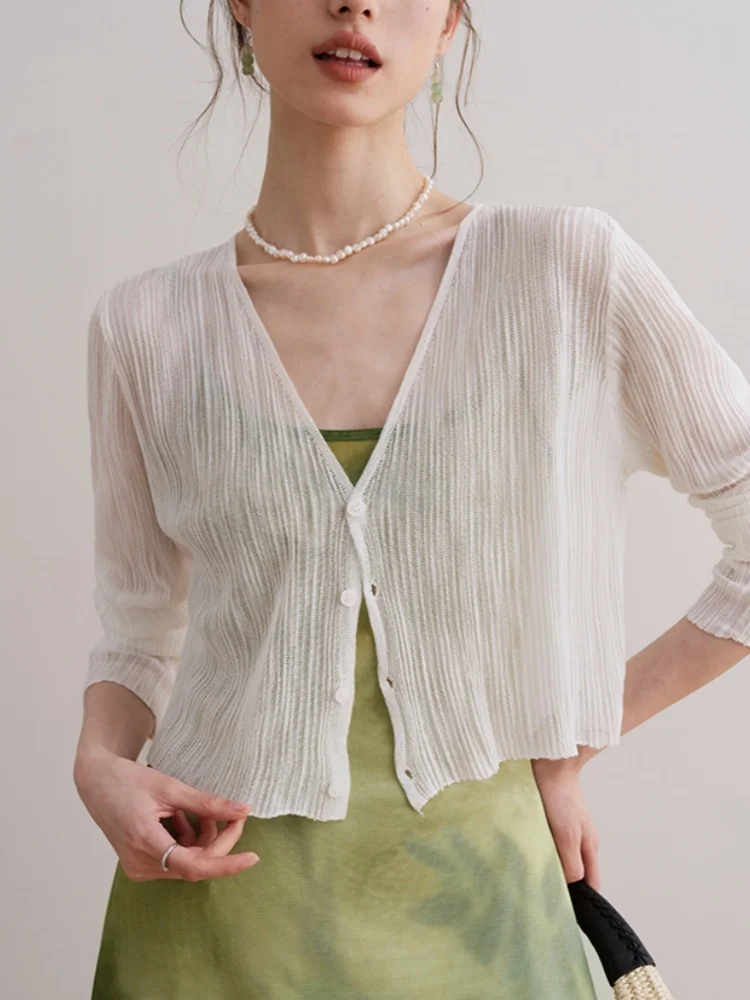 Ice Silk Knitted Light Weight Cardigan Shawl for Women Summer Strap Dresses Outer Covering Thin Film Top Korean Style Loose Fit
Ice Silk Knitted Light Weight Cardigan Shawl for Women Summer Strap Dresses Outer Covering Thin Film Top Korean Style Loose Fit