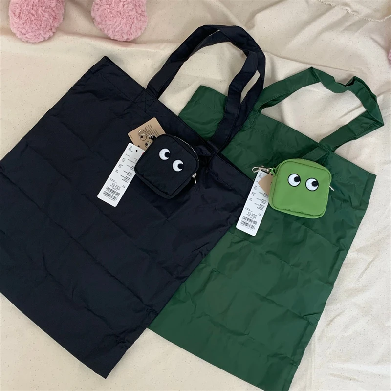 ANYA waterproof nylon tote Cute big eyes key case Large capacity leisure commuter shopping bag Alphabet bag
ANYA waterproof nylon tote Cute big eyes key case Large capacity leisure commuter shopping bag Alphabet bag