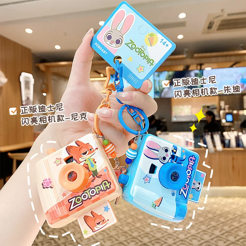 Оригинальный Zootopia Judy Hopps Nick Wilde Shining Camera, милая мультяшная сумка, брелок, подвеска, подарок, оптовая продажа, оптовая продажа, аксессуары
Оригинальный Zootopia Judy Hopps Nick Wilde Shining Camera, милая мультяшная сумка, брелок, подвеска, подарок, оптовая продажа, оптовая продажа, аксессуары