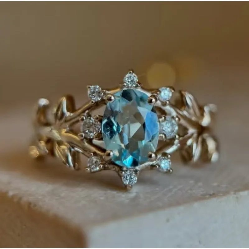 Gorgeous Gold Color Inlaid with Blue Stone Flower Rings Elegant Fashion Party Engagement Wedding Rings for Women Jewelry 
Gorgeous Gold Color Inlaid with Blue Stone Flower Rings Elegant Fashion Party Engagement Wedding Rings for Women Jewelry