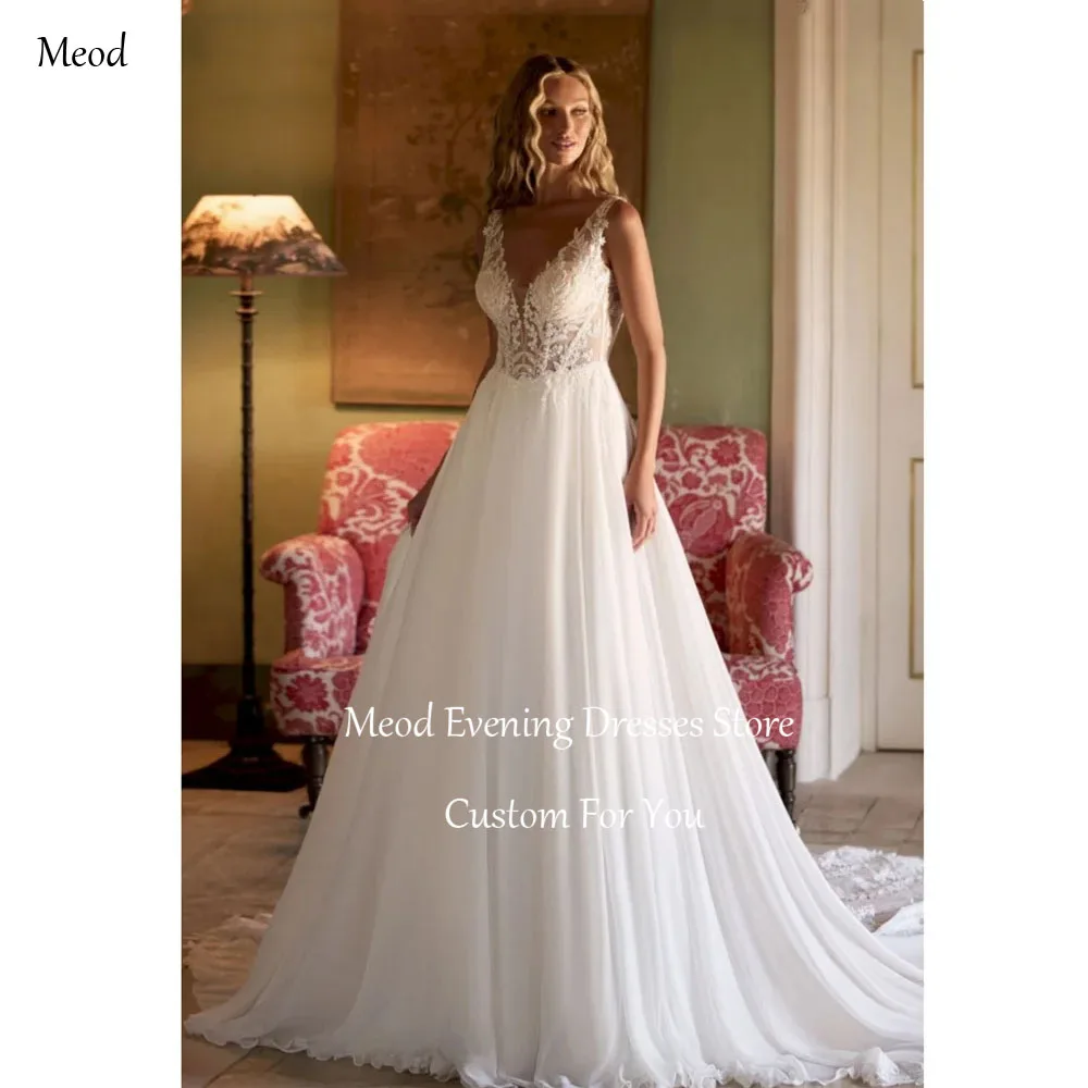 MEOD Long Train Appliques Women‘s Wedding Dress Deep V Neck Sleeveless Vestido Noiva Romantic Chiffon Wedding Gown Customized
MEOD Long Train Appliques Women‘s Wedding Dress Deep V Neck Sleeveless Vestido Noiva Romantic Chiffon Wedding Gown Customized