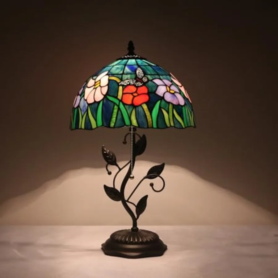 Tiffany table lamp for living room, stained glass and metal leaf base, bronze finish, handcrafted geometric pattern with warm a
Tiffany table lamp for living room, stained glass and metal leaf base, bronze finish, handcrafted geometric pattern with warm a