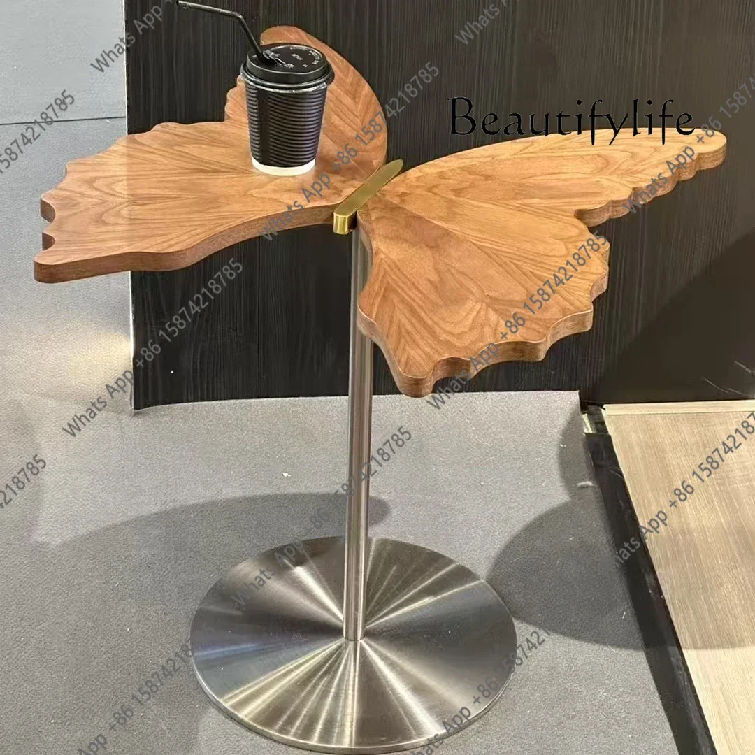 N19 Italian minimalist stainless steel butterfly coffee table sofa foot table creative household walnut shaped edge table irregu
N19 Italian minimalist stainless steel butterfly coffee table sofa foot table creative household walnut shaped edge table irregu