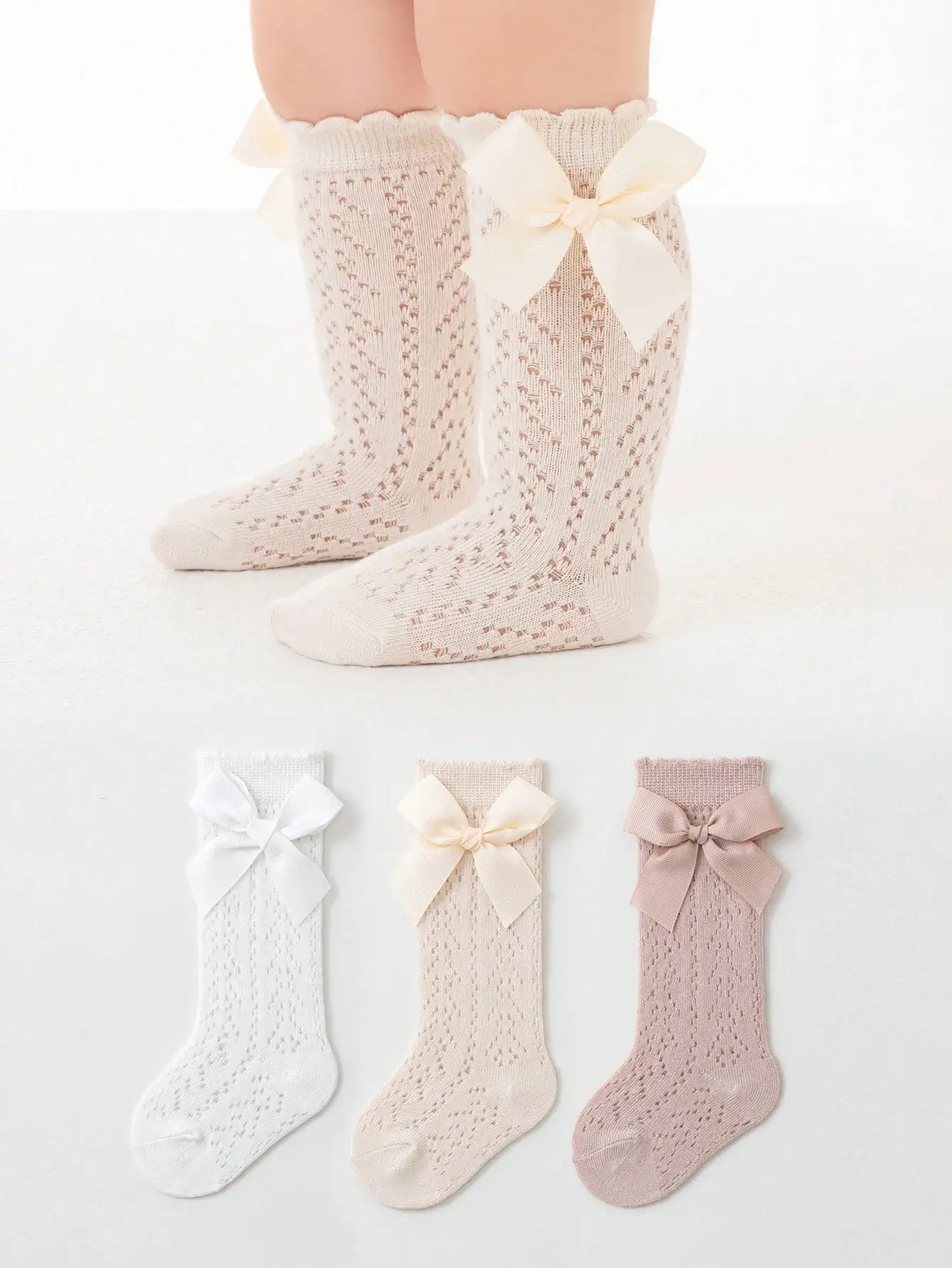 Girls' solid colour breathable knee-length dress socks with bow lace decoration
Girls' solid colour breathable knee-length dress socks with bow lace decoration