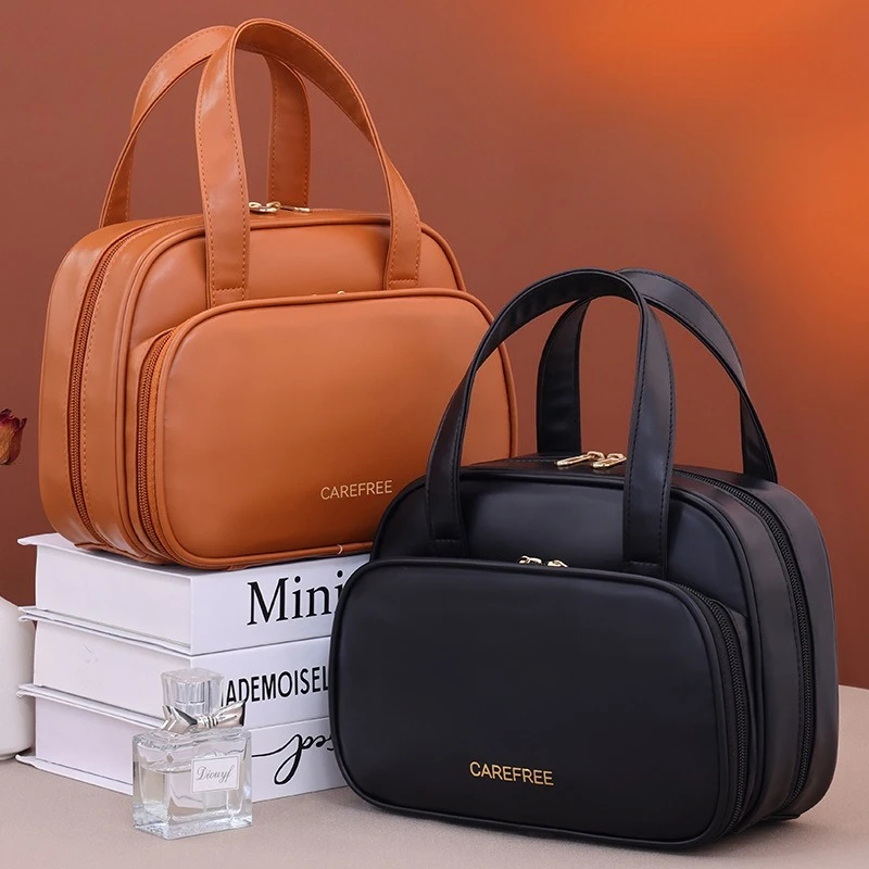 Женская косметичка из искусственной кожи - косметический органайзер большой емкости с ремешком-ручкой, для путешествий и ежедневного использования
Женская косметичка из искусственной кожи - косметический органайзер большой емкости с ремешком-ручкой, для путешествий и ежедневного использования