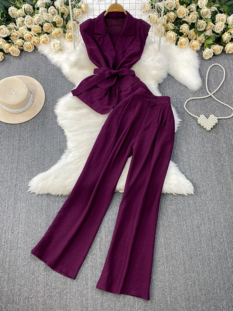 Two piece set of high-end professional suit collar sleeveless waist cinched vest top+high waist slimming wide leg pants
Two piece set of high-end professional suit collar sleeveless waist cinched vest top+high waist slimming wide leg pants