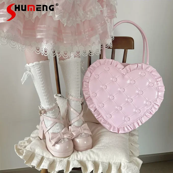 Princess Style Pink Lolita Handbag Japanese Girl's Sweet Elegant Love Shape Lo Handbag 2026 New Women's Messenger Bag
Princess Style Pink Lolita Handbag Japanese Girl's Sweet Elegant Love Shape Lo Handbag 2026 New Women's Messenger Bag