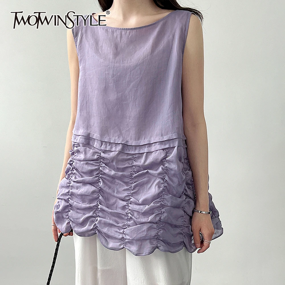 TWOTWINSTYLE Solid Loose Spliced Folds Design Sense Blouses for Women Round Neck Sleeveless Casual Blouse Female 2026 Spring New
TWOTWINSTYLE Solid Loose Spliced Folds Design Sense Blouses for Women Round Neck Sleeveless Casual Blouse Female 2026 Spring New