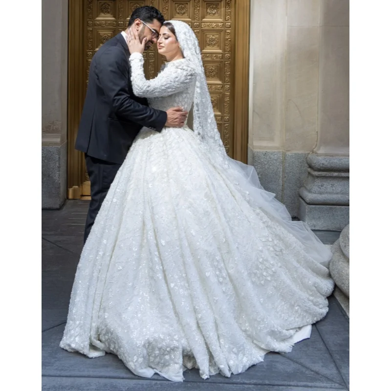 Customized white elegant large skirt wedding dress long sleeved round neck satin patch fluffy skirt Vestidos De Noiva
Customized white elegant large skirt wedding dress long sleeved round neck satin patch fluffy skirt Vestidos De Noiva