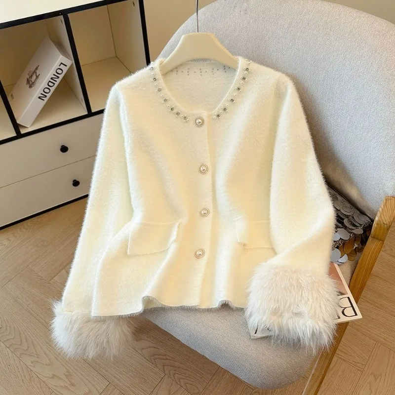 Imitation Mink Fleece Sweater Cardigan Women's Autumn and Winter 2026 New High-end Temperament Splicing Feather Knitted Jacket
Imitation Mink Fleece Sweater Cardigan Women's Autumn and Winter 2026 New High-end Temperament Splicing Feather Knitted Jacket