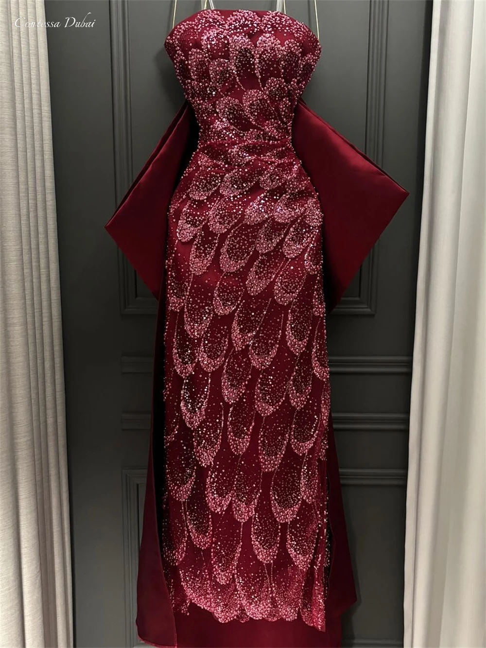 Contessa Custom Overskirt Bow Beaded Evening Dress Strapless Robes De Soirée Elegant Sheath Mermaid Formal Evening Gowns 2026
Contessa Custom Overskirt Bow Beaded Evening Dress Strapless Robes De Soirée Elegant Sheath Mermaid Formal Evening Gowns 2026