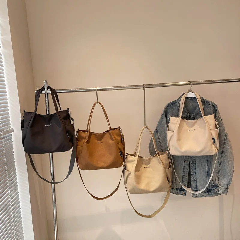 Casual Large Capacity Canvas Tote Bag Women's Shoulder Crossbody Bag Simple Match Commuting Bag for Class And Fitness
Casual Large Capacity Canvas Tote Bag Women's Shoulder Crossbody Bag Simple Match Commuting Bag for Class And Fitness