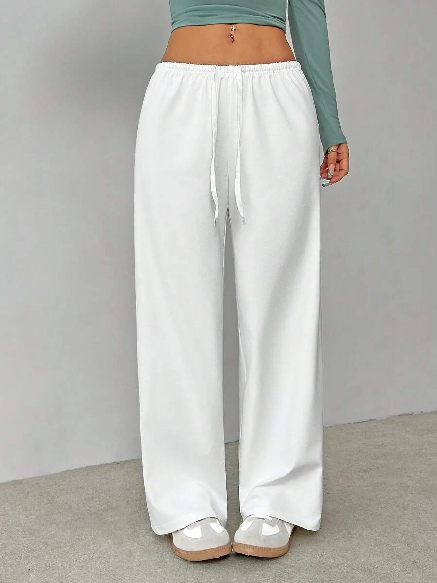 Soft White Knitted Wide-Leg Lounge Pants with Drawstring Waist
Soft White Knitted Wide-Leg Lounge Pants with Drawstring Waist