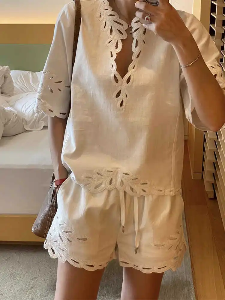 Clothland Women White Embroidery Linen Suit Short Sleeve V Neck Hollow Out Lace Shirt Mini Shorts Fashion Two Piece Set TA613
Clothland Women White Embroidery Linen Suit Short Sleeve V Neck Hollow Out Lace Shirt Mini Shorts Fashion Two Piece Set TA613
