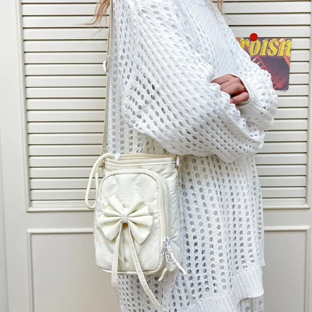 Nylon Rope Bow Drawstring Crossbody Bags Solid Color Coin Pouch Mobile Phone Bag Korean Style Casual Water Bottle Pouch Outdoor
Nylon Rope Bow Drawstring Crossbody Bags Solid Color Coin Pouch Mobile Phone Bag Korean Style Casual Water Bottle Pouch Outdoor