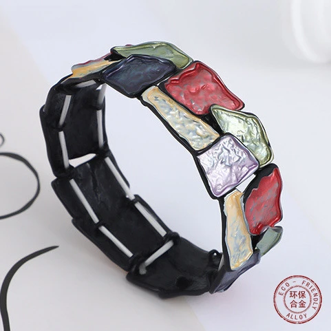 Hot-selling conformal color oil bracelet artificial irregular shape splicing alloy elastic chain bracelet
Hot-selling conformal color oil bracelet artificial irregular shape splicing alloy elastic chain bracelet