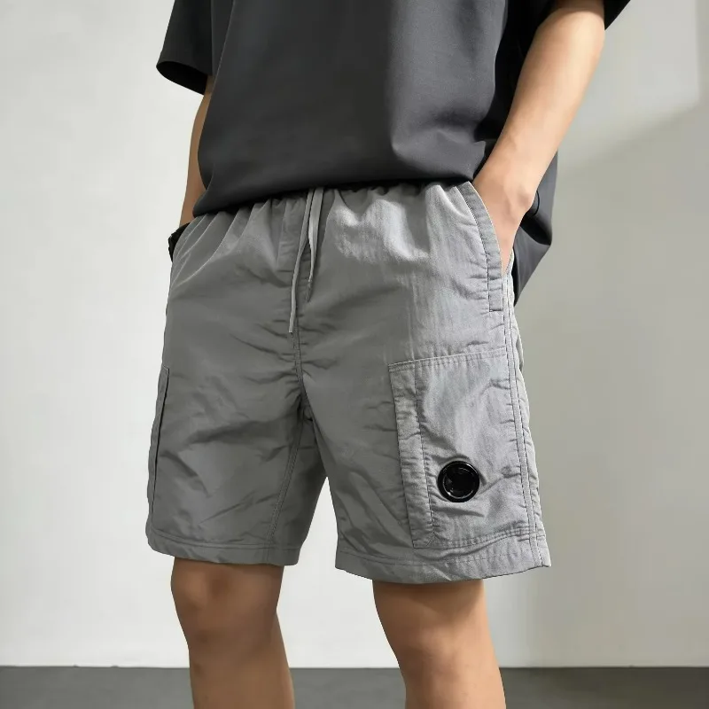 Pantalon décontracté pour homme style Y2K, détails miroir, cordon de serrage, style streetwear, short décontracté d'été
Pantalon décontracté pour homme style Y2K, détails miroir, cordon de serrage, style streetwear, short décontracté d'été