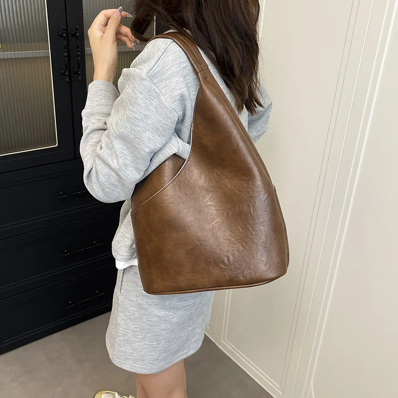 Винтажные осенние сумки на плечо 2025 года, роскошные сумки-ведра из мягкой кожи, большие вместительные дорожные сумки-тоут, женские сумки-кошельки 
Винтажные осенние сумки на плечо 2025 года, роскошные сумки-ведра из мягкой кожи, большие вместительные дорожные сумки-тоут, женские сумки-кошельки