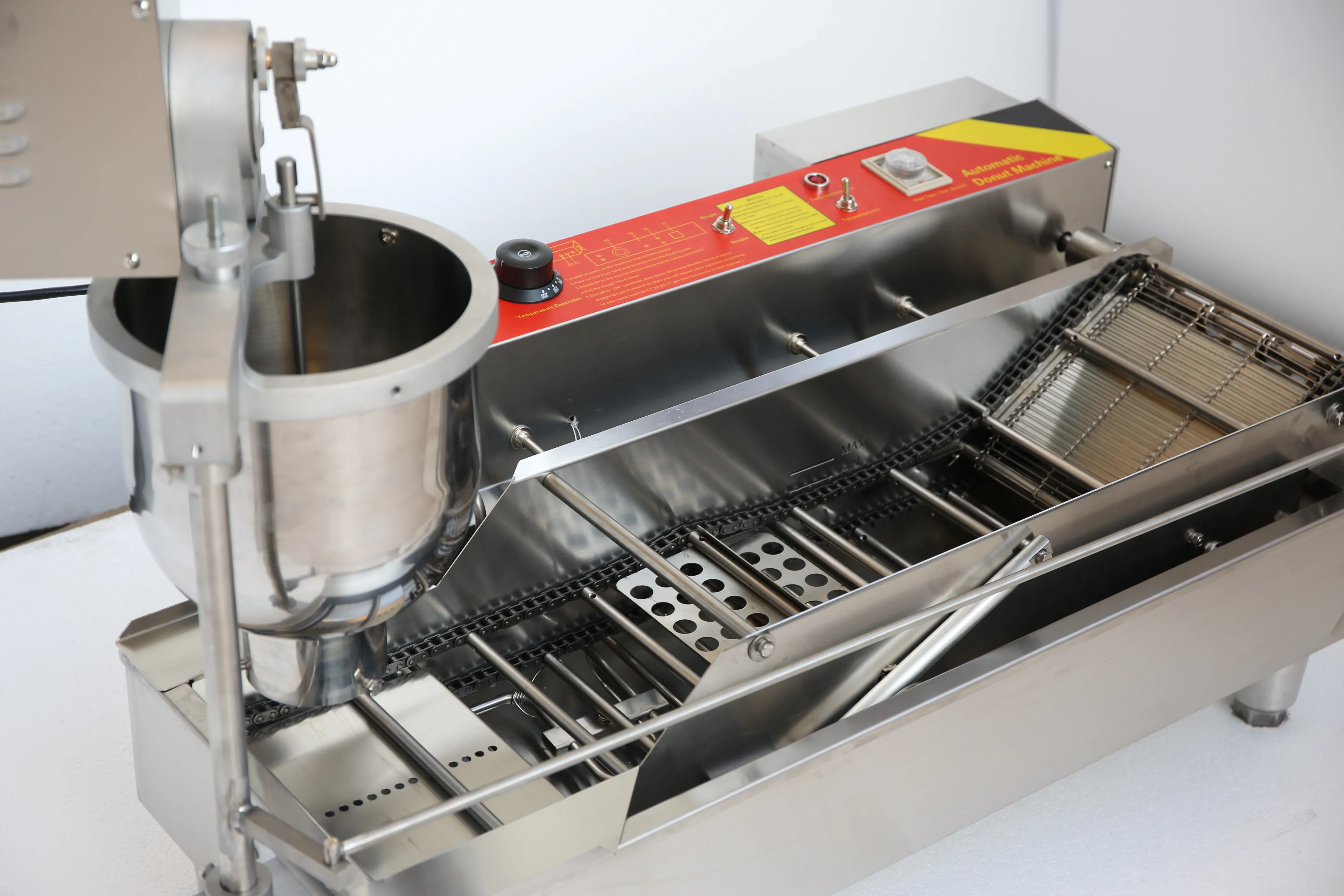 Automatic Doughnut Commercial Kitchen Machine With Fully Automatic Doughnut Frying Machine
Automatic Doughnut Commercial Kitchen Machine With Fully Automatic Doughnut Frying Machine