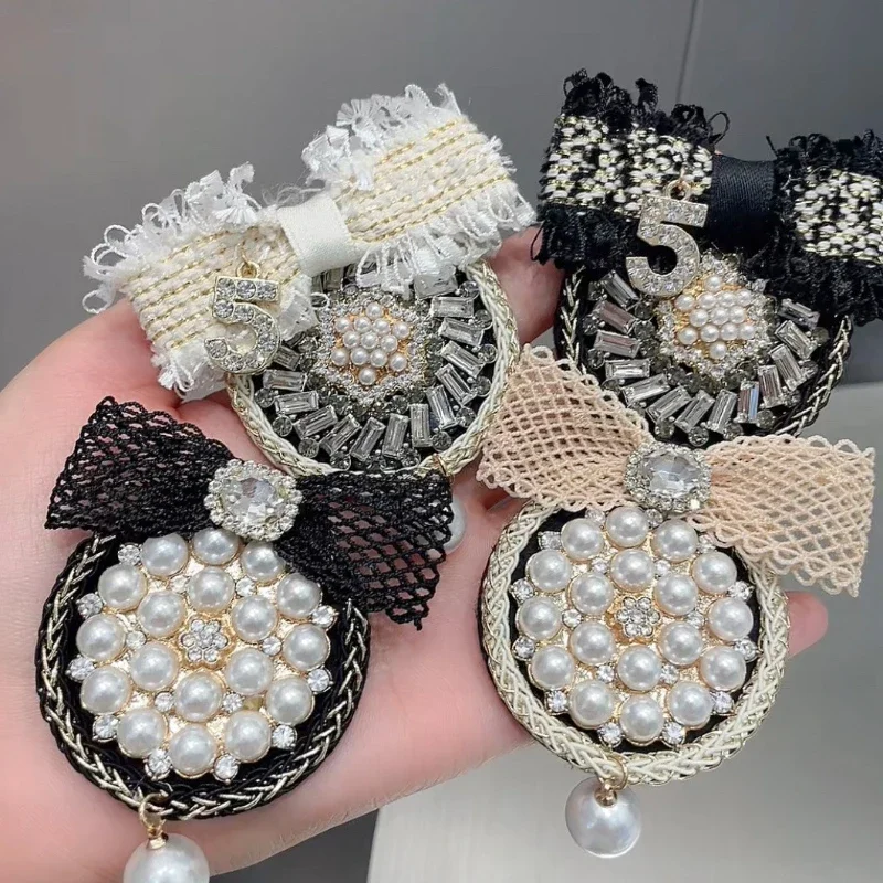 High-end Fabric Bow Brooches for Women Pearl Rhinestone Badge Sweater Suit Collar Pins Vintage Corsage Jewelry Accessories
High-end Fabric Bow Brooches for Women Pearl Rhinestone Badge Sweater Suit Collar Pins Vintage Corsage Jewelry Accessories
