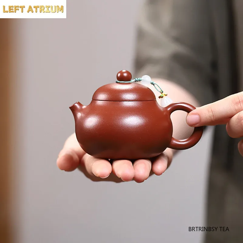 Tradition Yixing Purple Clay Teapot Handmade Raw Ore Dahongpao Tea Pot Cute Household Kettle Chinese Zisha Tea Set Teaware 120ml
Tradition Yixing Purple Clay Teapot Handmade Raw Ore Dahongpao Tea Pot Cute Household Kettle Chinese Zisha Tea Set Teaware 120ml