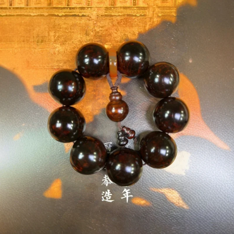 Lao imitation Hainan Huanghuali wood for men and women, decorative firework material Buddhist bead bracelet 3.0
Lao imitation Hainan Huanghuali wood for men and women, decorative firework material Buddhist bead bracelet 3.0