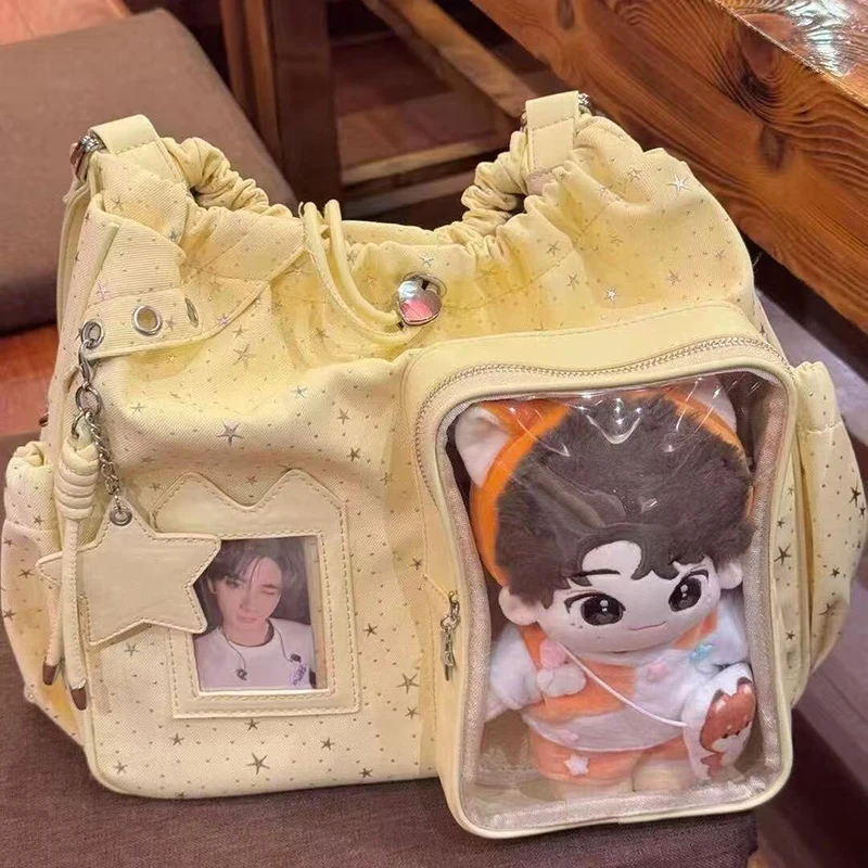 Рюкзак-мешок Y2K в корейском стиле с принтом звезд, холщовый, на шнурке, большой вместимости, для поездок на работу, прозрачная сумка-витрина DIY
Рюкзак-мешок Y2K в корейском стиле с принтом звезд, холщовый, на шнурке, большой вместимости, для поездок на работу, прозрачная сумка-витрина DIY