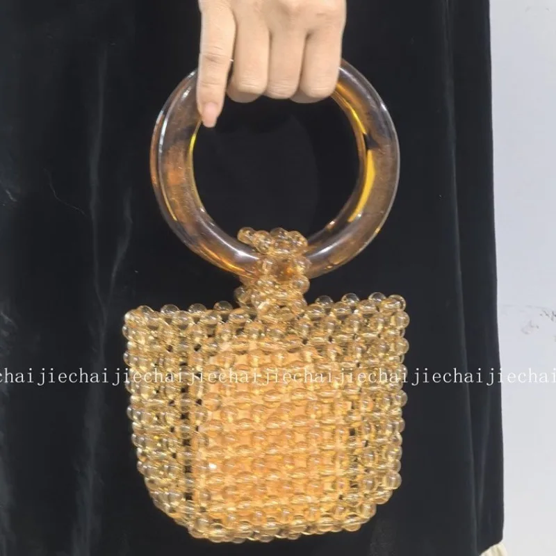 Fashion Retro Handmade Woven Acrylic Bead Women's Bags High-end Circular Hand-held Banquet Bag Fashionable Versatile Handbag
Fashion Retro Handmade Woven Acrylic Bead Women's Bags High-end Circular Hand-held Banquet Bag Fashionable Versatile Handbag