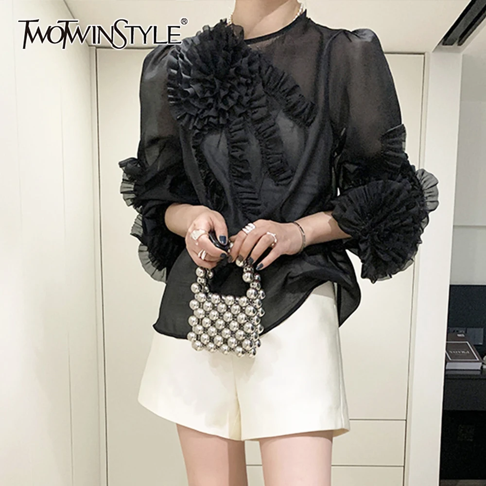TWOTWINSTYLE Black Spliced Fungus Basics Shirt Female O Neck Long Sleeve Irregular Women's Shirts Summer Style Fashion Clothes
TWOTWINSTYLE Black Spliced Fungus Basics Shirt Female O Neck Long Sleeve Irregular Women's Shirts Summer Style Fashion Clothes
