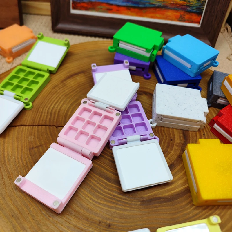 Empty Palette Portable Folding Watercolor Box 9 Compartments 0.5ML Paint Tray 3D Printing Travel Painting Artist's Art Supplies
Empty Palette Portable Folding Watercolor Box 9 Compartments 0.5ML Paint Tray 3D Printing Travel Painting Artist's Art Supplies