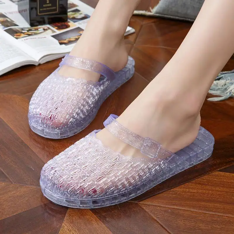 Женские прозрачные хрустальные тапочки Baotou, летние нескользящие водонепроницаемые домашние тапочки на плоской подошве, уличные пляжные тапочки
Женские прозрачные хрустальные тапочки Baotou, летние нескользящие водонепроницаемые домашние тапочки на плоской подошве, уличные пляжные тапочки