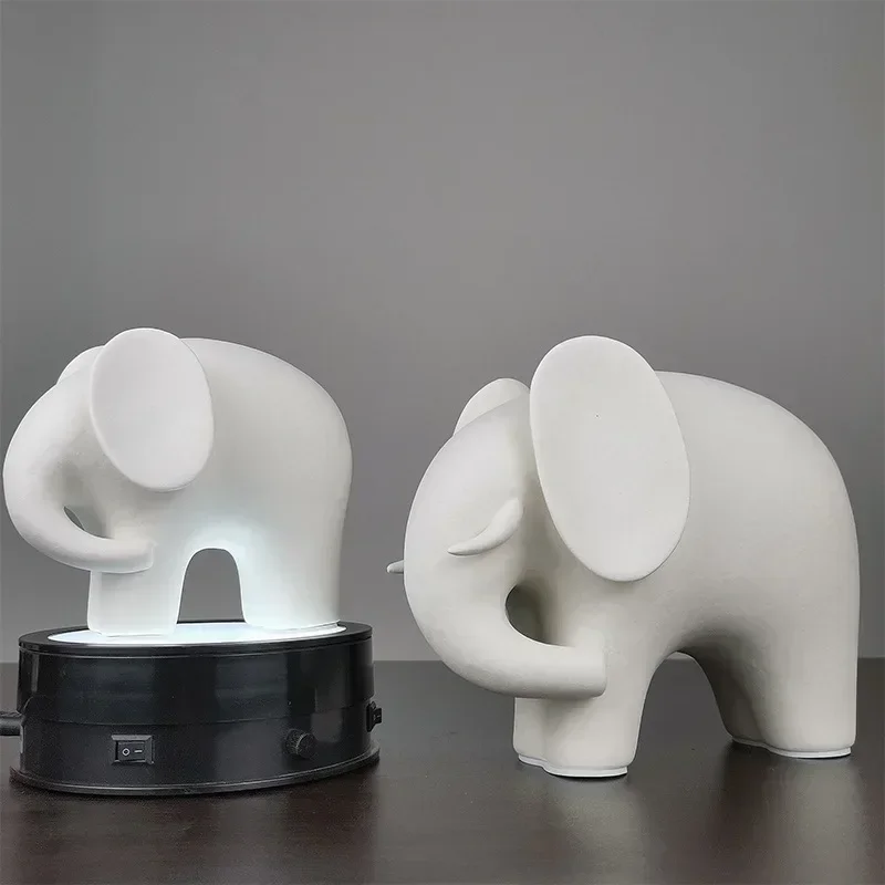 Lucky White Elephant Ceramic Office Living Room Bedroom Desktop Dining Table Modern Simple Creative Home Decoration Crafts
Lucky White Elephant Ceramic Office Living Room Bedroom Desktop Dining Table Modern Simple Creative Home Decoration Crafts