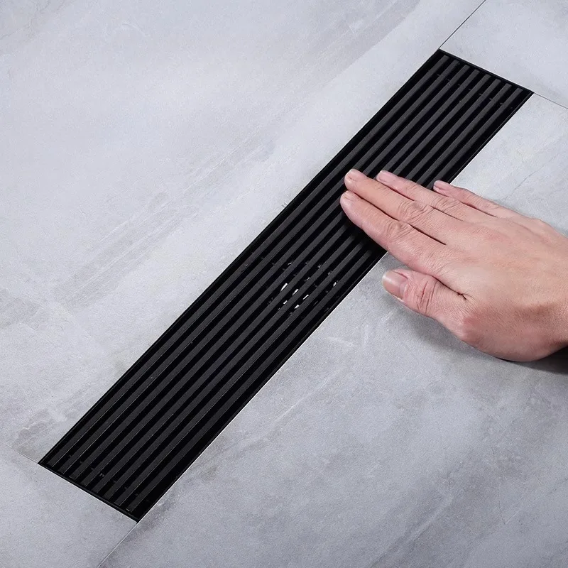 Long Strip Shower Room Black Floor Drain Solid Bamboo Row 304 Stainless Steel Long Floor Drain Toilet Anti Odor Floor Drain
Long Strip Shower Room Black Floor Drain Solid Bamboo Row 304 Stainless Steel Long Floor Drain Toilet Anti Odor Floor Drain