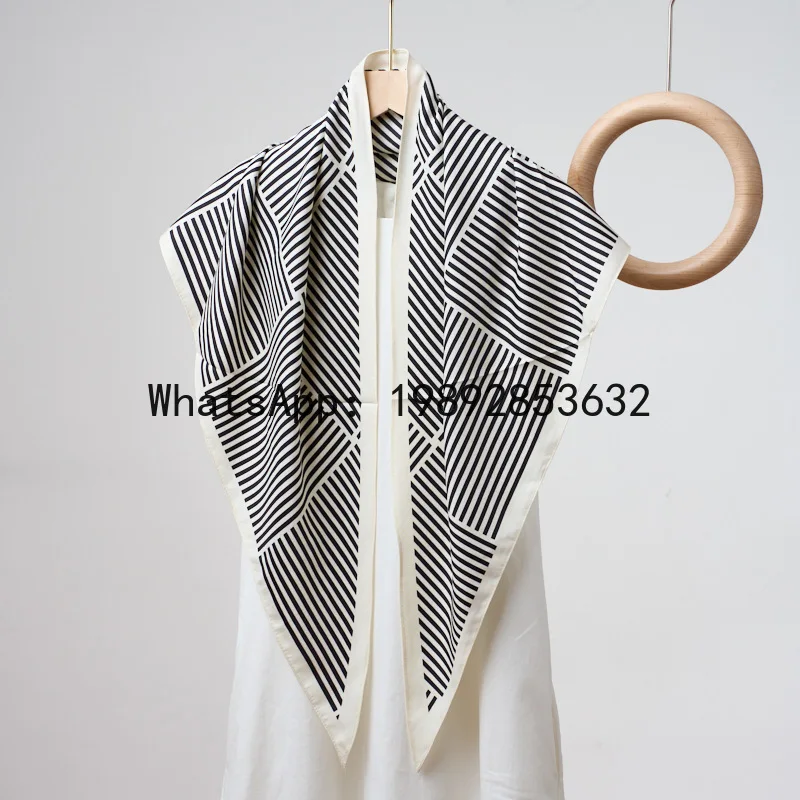 Minimalist black and white line print triangle scarf - versatile accessory for women's outfits, includes belt
Minimalist black and white line print triangle scarf - versatile accessory for women's outfits, includes belt