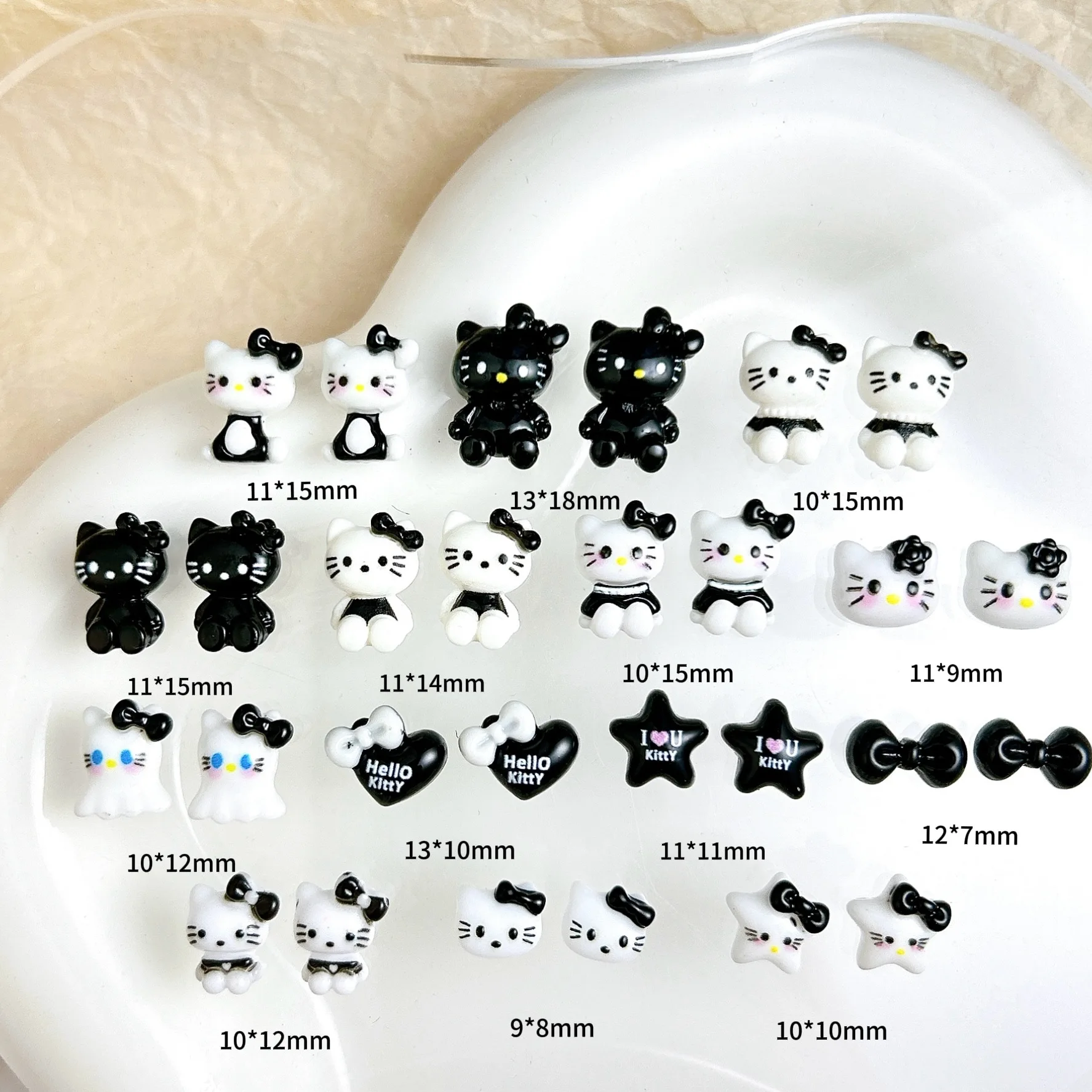 50Pcs Black and White Hello Kitty Nail Charms Cute 3D Heart and Bowtie Nail Art Accessories for a Stylish and Adorable Manicure
50Pcs Black and White Hello Kitty Nail Charms Cute 3D Heart and Bowtie Nail Art Accessories for a Stylish and Adorable Manicure