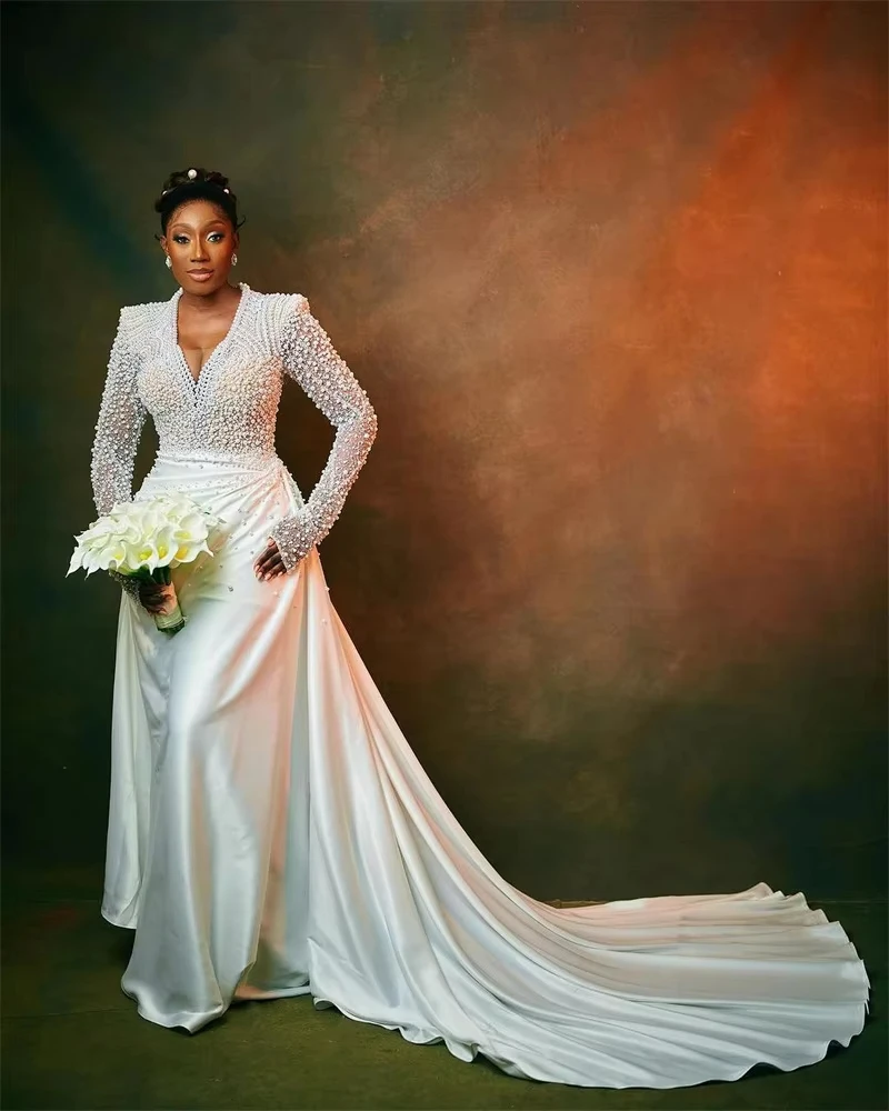 Customized Deep V Neck Spark Pearls Mermaid Wedding Dress African Robe De Marriage Long Sleeves Satin Pleated Bridal Gown
Customized Deep V Neck Spark Pearls Mermaid Wedding Dress African Robe De Marriage Long Sleeves Satin Pleated Bridal Gown
