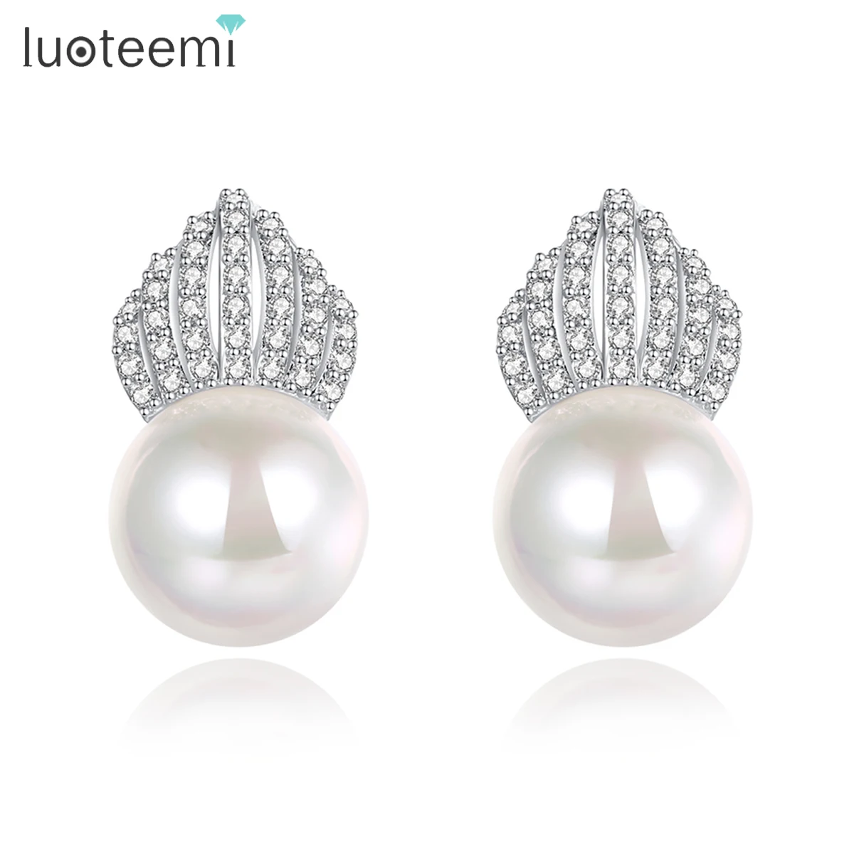 LUOTEEMI Classic Tiny Clear AAA Zircon Inlay Crown Stud Earring White Imitation Pearl Elegant Women Silver Color Wedding Jewelry
LUOTEEMI Classic Tiny Clear AAA Zircon Inlay Crown Stud Earring White Imitation Pearl Elegant Women Silver Color Wedding Jewelry
