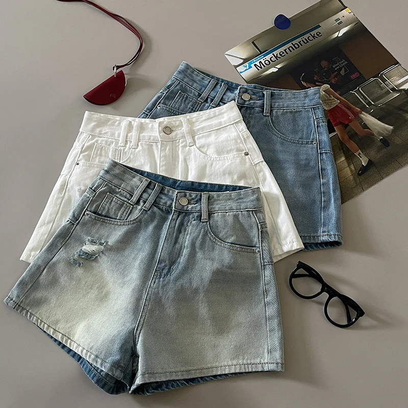 Женские джинсовые шорты с дырками, белые потертые шорты с высокой талией, женские летние модные свободные уличные универсальные короткие джинсы
Женские джинсовые шорты с дырками, белые потертые шорты с высокой талией, женские летние модные свободные уличные универсальные короткие джинсы