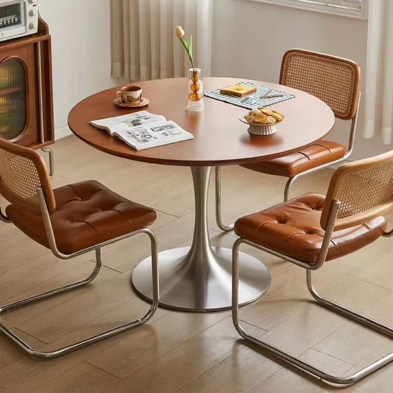 Medieval style all solid wood tulip small small apartment household retro round and chair combination Internet celebrity table
Medieval style all solid wood tulip small small apartment household retro round and chair combination Internet celebrity table