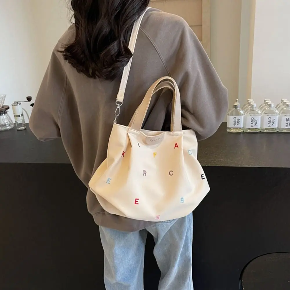 Korean Style Letter Embroidery Tote Bag Colorful Printing Canvas Shoulder Bag Large Capacity Handbag Women Crossbody Bag
Korean Style Letter Embroidery Tote Bag Colorful Printing Canvas Shoulder Bag Large Capacity Handbag Women Crossbody Bag