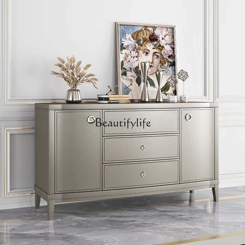 American light luxury solid wood dining side wine cabinet simple champagne color living room storage entrance
American light luxury solid wood dining side wine cabinet simple champagne color living room storage entrance