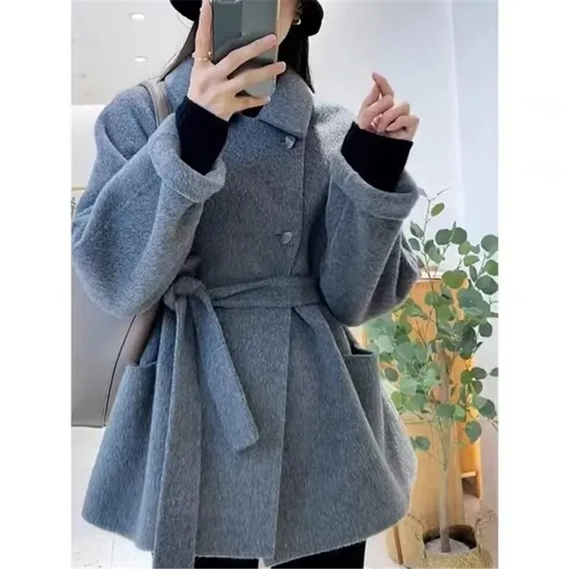 Double-Sided Velvet Long Coat Coats Female Design Advanced Feeling Lapel Bud Pocket Loose Slim Solid Color Woolen Coat
Double-Sided Velvet Long Coat Coats Female Design Advanced Feeling Lapel Bud Pocket Loose Slim Solid Color Woolen Coat
