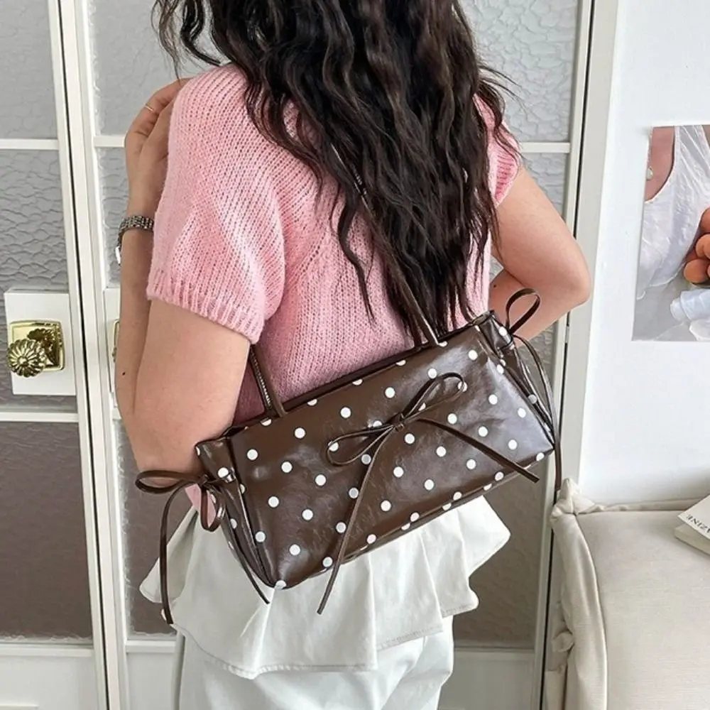 Elegant Polka Dot Underarm Bag Long Shoulder Strap Glossy Finish PU Bow Shoulder Bag Minimalist Design Slim Rectangular Handbag
Elegant Polka Dot Underarm Bag Long Shoulder Strap Glossy Finish PU Bow Shoulder Bag Minimalist Design Slim Rectangular Handbag