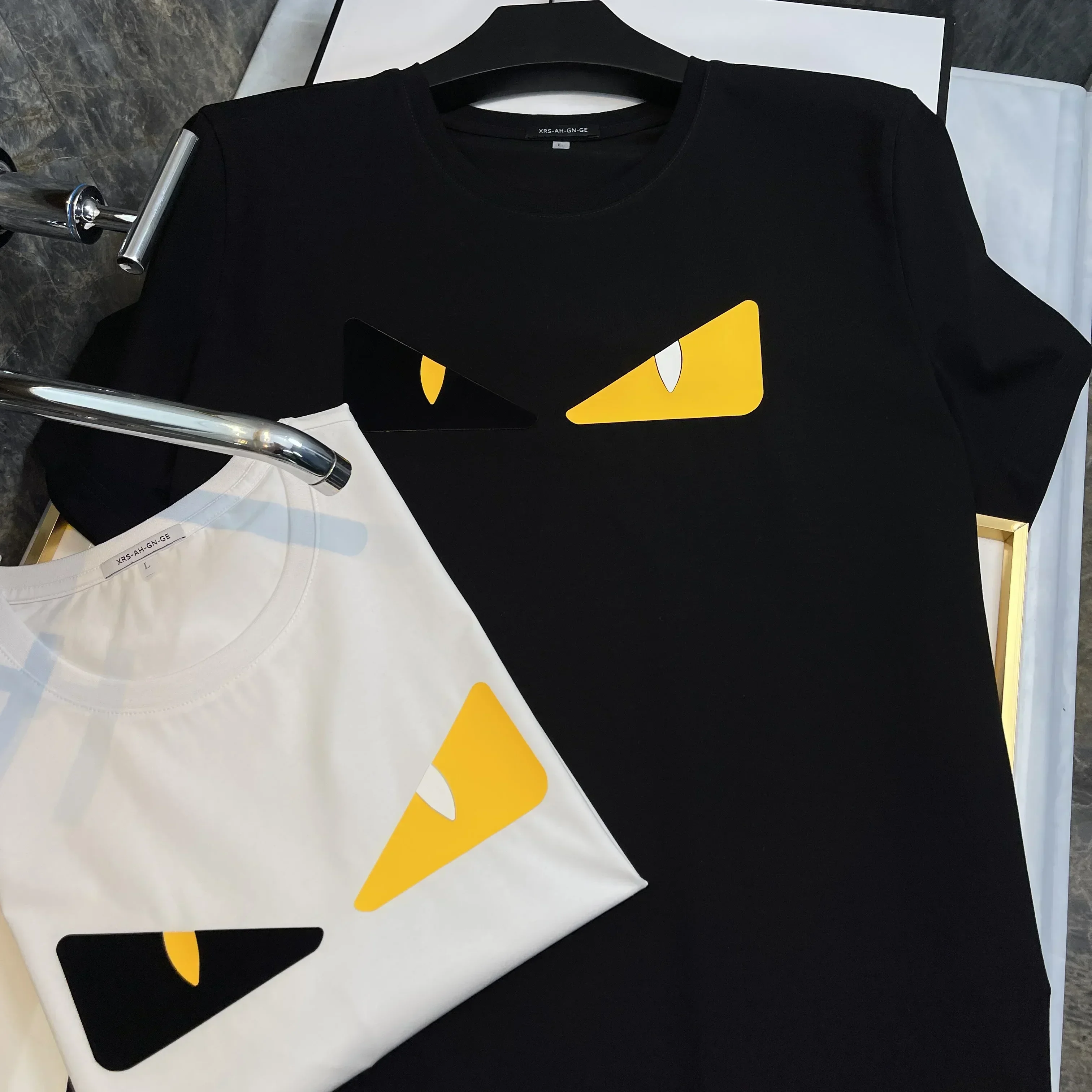 European New Short-sleeved T-shirt Men's Fashion Trendy Brand Little Monster Eye Printing Clothes Pure Cotton Slim-fitting Top
European New Short-sleeved T-shirt Men's Fashion Trendy Brand Little Monster Eye Printing Clothes Pure Cotton Slim-fitting Top