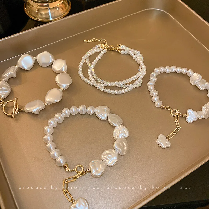 Irregular Imitation Pearl T-buckle Bracelet French Fashion Design Sense Retro Love Bracelet Temperament Jewelry Women
Irregular Imitation Pearl T-buckle Bracelet French Fashion Design Sense Retro Love Bracelet Temperament Jewelry Women